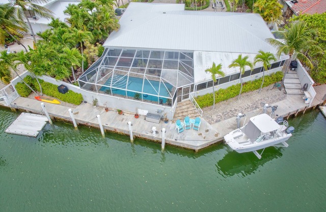 Sombrero Shores ~ Waterfront Oasis w/Pool, Hot Tub, 63' Dock & By The Beach