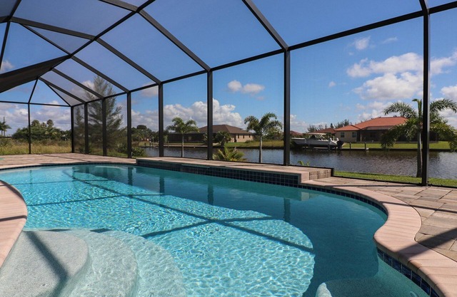 South Gulf Cove 3 Bedroom Canal Pool Home