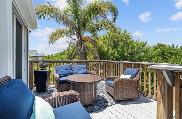 Spacious 3BR, 2BA beach home just a short walk from the sand! Three bedrooms up, private queen room and bath down. Secure 2-car garage for vehicles or a small boat. Perfect for families or groups. 30-day minimum stay required.