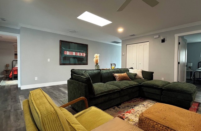 Spacious 4-Bed Retreat with Pool Short Stroll to the Beach