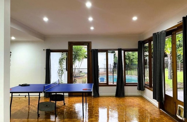 Spacious 5-bedroom house in beautiful Brighton East with AC, WiFi, fitness room