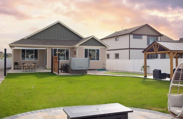 Spacious 5-bedroom house in charming Windsor with WiFi, hot tub and game room.