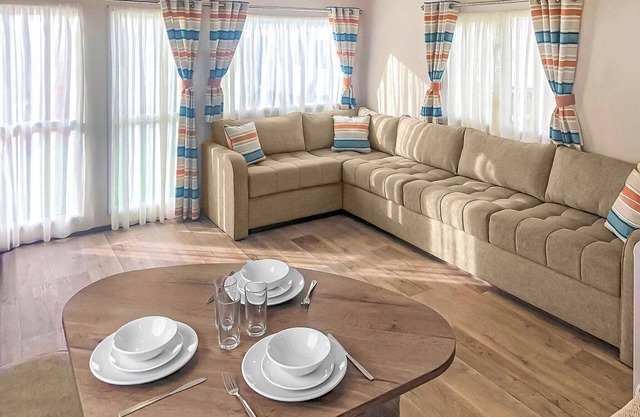 Spacious and comfortable 12ft-wide caravan with one double and two twin.