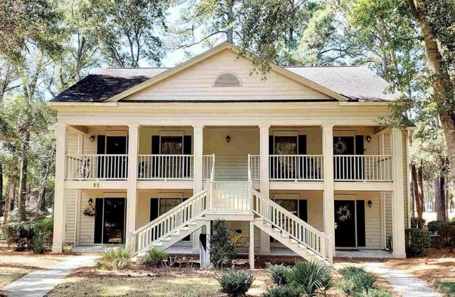 Spacious condo on Jack Nicklaus Signature Golf Course overlooking 10th Tee Box.