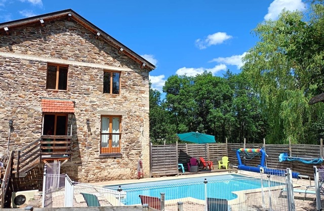 Spacious gite (sleeps 11)with heated pool in the glorious Auvergne countryside.