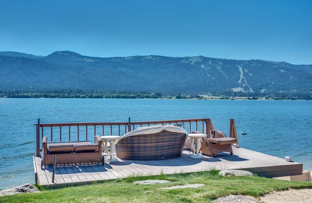 Spacious lakefront home with private docks, beach, modern perks