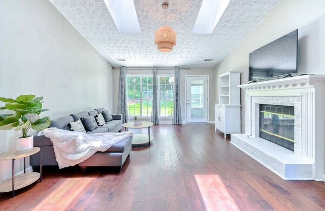 Spacious ranch home w/skylight ceiling & attached sunroom. 3 mins to interstate.