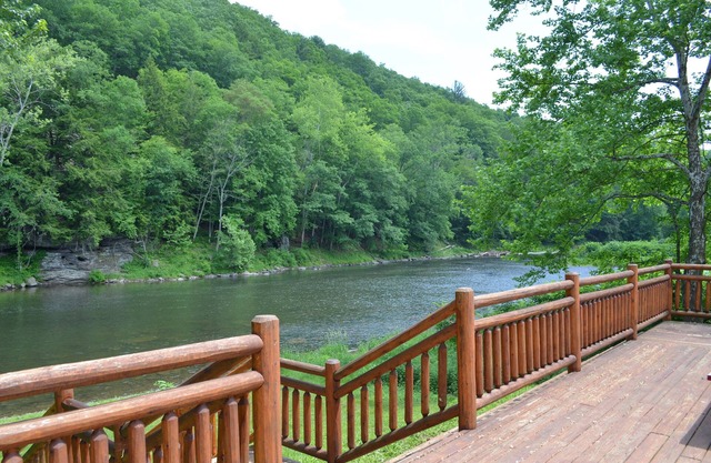 Spectacular Catskill Mountain River Front Custom Log Home