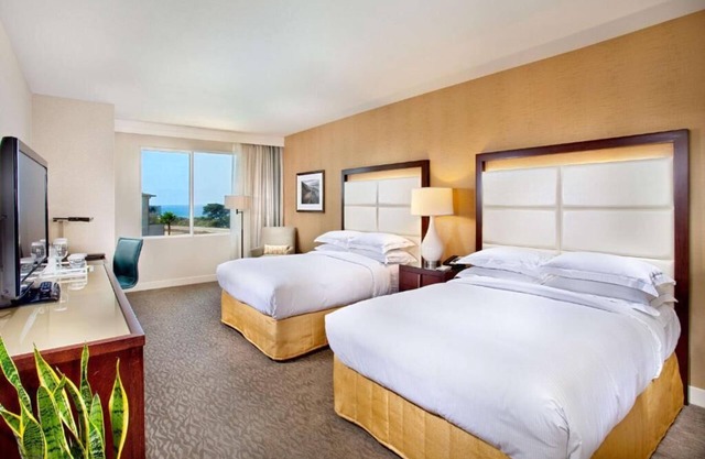 Stay Close to South State Beach: Swimming Pool, Pet-friendly, Parking Onsite!