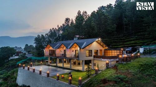 StayVista at Ambrosia access to water stream