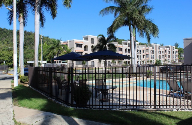 Steps away from a soft sand beach and warm waters