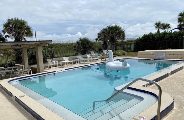 STEPS TO THE BEACH AND GATED POOL! - Dog Friendly - Centrally Located