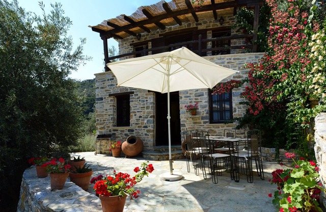 Stone Cottage in traditional Greek village with spectacular sea views