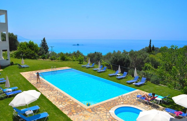 Studio Apartments with large swimming pool and Sea view at Pelekas Beach Corfu