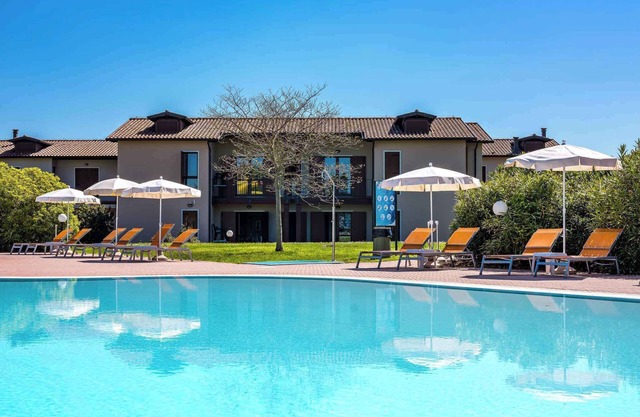 Studio with outdoor pool and children's entertainment in a great residence