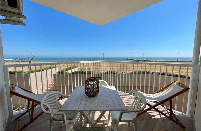Stunning seafront terraced apartment