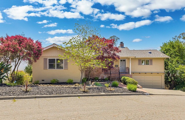 Stunning 4BR home in Oakmore Highlands with views, upgrades & great location!