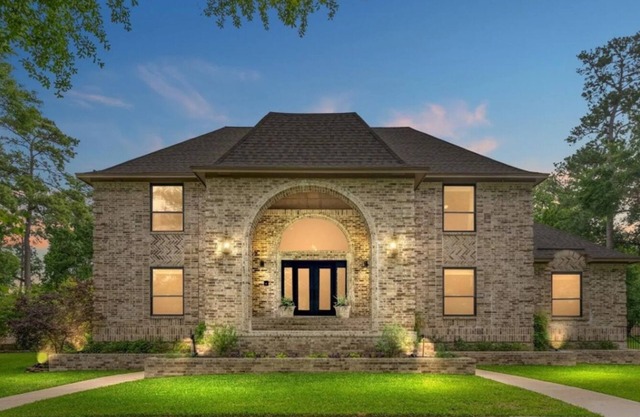 Stunning estate with a large pool & fenced yard. Elegant & impressive.