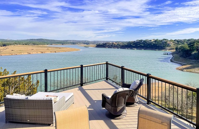 Stunning lakefront home with 2 patios, chef's kitchen, & lake access
