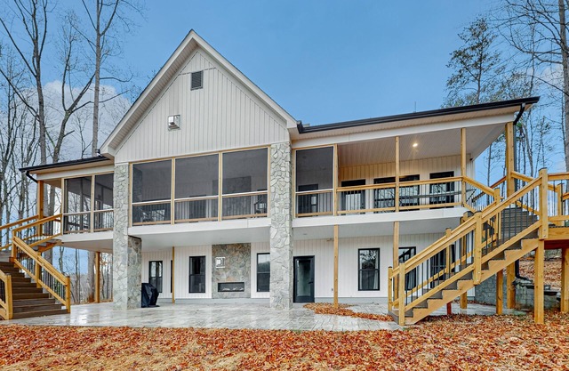 Stunning lakefront oasis with a kayak, large deck, games, & tranquil views