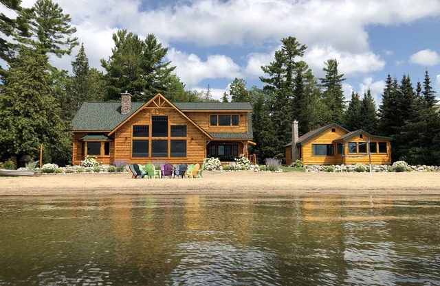 Stunning Log Home Plus Guest Cottage With Sandy Beach!