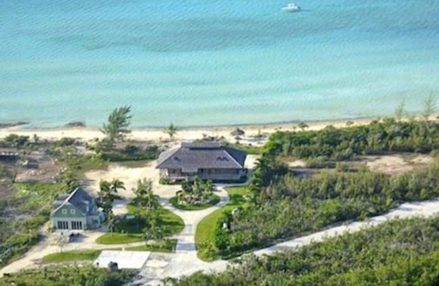 Stunning Sunset Beachfront Estate with mooring