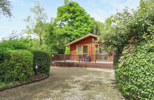 Stunning well-equipped lodge set in mature and beautiful gardens.
