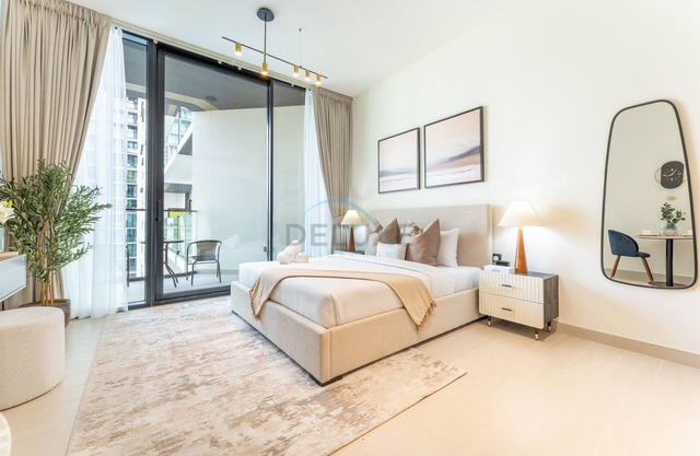 Stylish Stay Near Dubai Autodrome & Trump Golf Club, Binghatti Amber, by Deluxe Holiday Homes