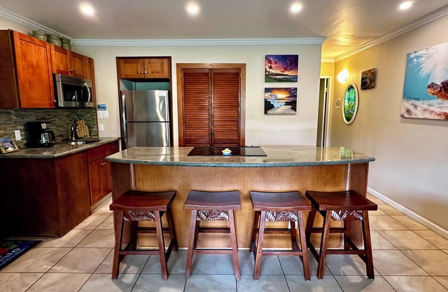 Summer DEALS! Partial Ocean View Condo with pool - just steps from the beach.