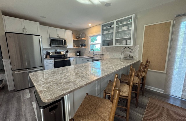 Sunset Skies: walk to Water's Edge, 2 homes in 1, pet-friendly, fully redone!