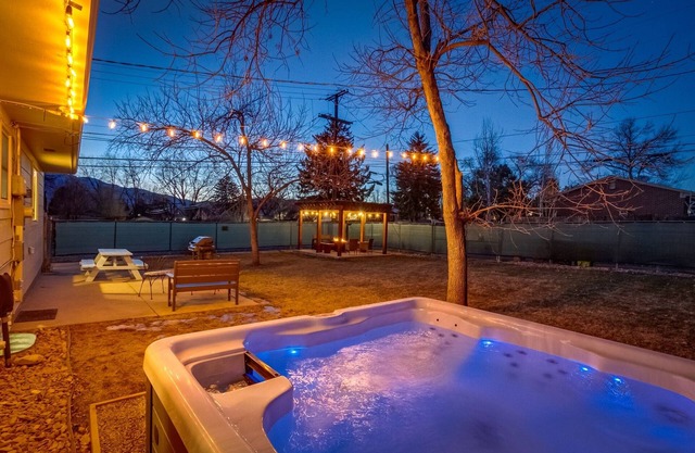 Tastefully Updated Central Springs Escape with Hot Tub, Pergola, and Fire Pit