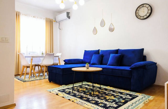 The flat is located just 1 minute walk from the Skanderbeg square.