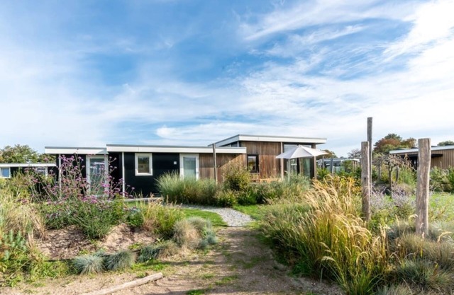 The Scandinavian and Zeeland influences give this chalet a unique style! The beautiful dune garden w