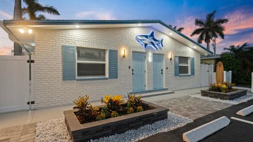 The Shark Tank Cocoa Beach - 2 2BR Units - 4BR Total - Each Unit Sleeps 5 - Walk to Downtown & Beach
