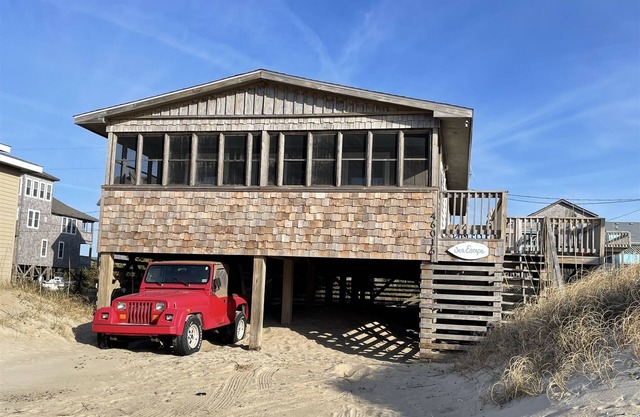 This heavenly beach cottage Sea Escape is just steps from the ocean!