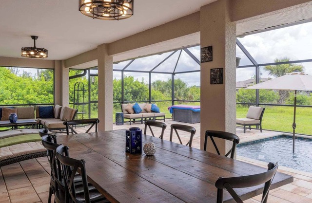 This house is a 5 bedroom(s), 3 bathrooms, located in Port Charlotte, FL.