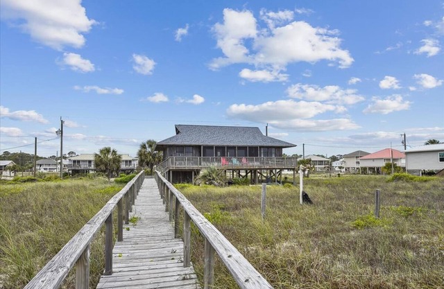 This Quintessential Beach Cottage Invites You To Indulge In The Essence Of The Beach