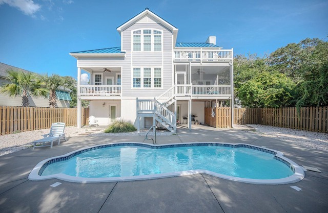 Time Stands Still: 4 Bed/3 Bath Home with Private Fenced In Pool Only One Block