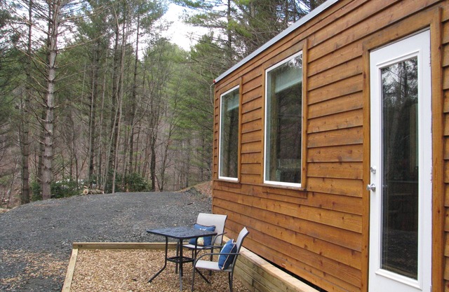 Tiny House On Wheels across from New River