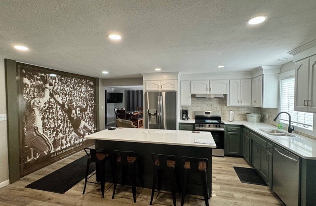 TOUCHDOWN! 5-Star newly updated home w/a short walk to historic Lambeau Field!