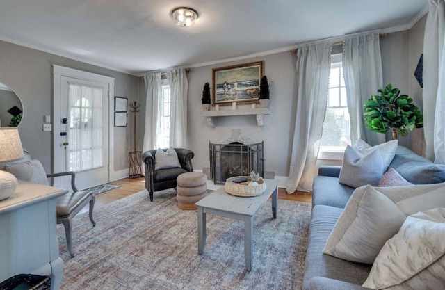 Treat yourself to this 4BR/2BA 1930s brick Tudor that exudes pure Southern charm