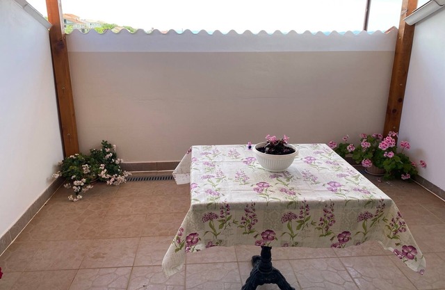 Two bedroom apartment with terrace and sea view Lun, Pag (A-11781-d)