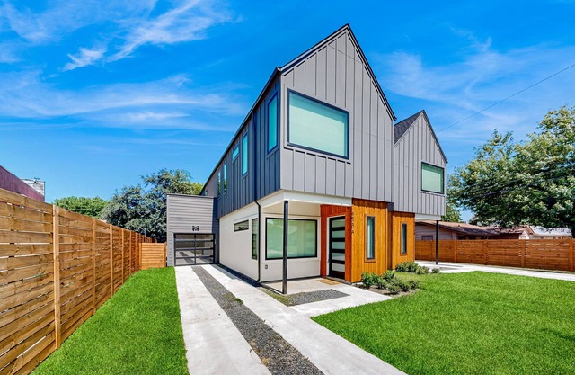Two modern townhouses with enclosed backyards