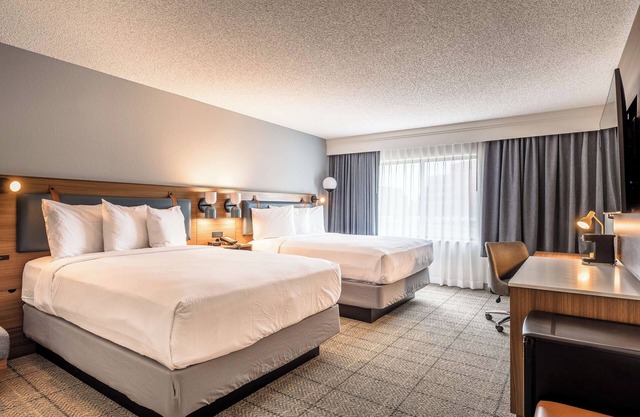 Two Units Just Minutes Away From Eagle Stadium, w/FREE Parking & Outdoor Pool!