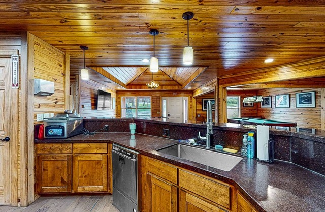 Two water-view cabins with grills, fireplaces, shared amenities, cable, AC