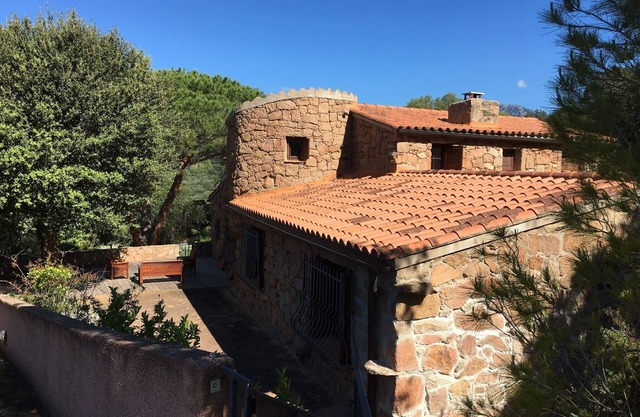 Typical Corsican villas in landscaped park with swimming pool South Corsica