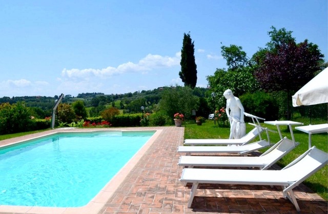 Typical villa with pigeon house known as “piccionaia” 2 km from Marciano della Chiana, in a hilly an