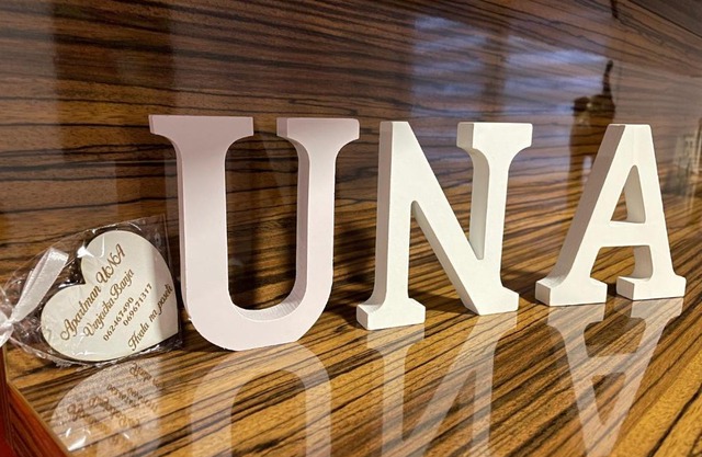 Una