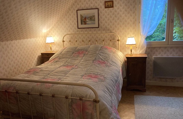 Une Maison au Calme Dans un Grand Parc