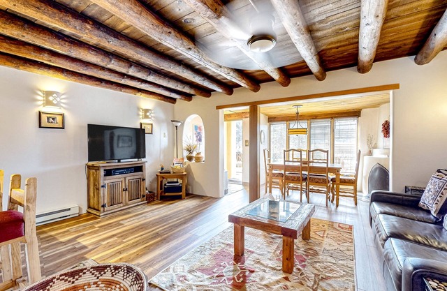 Unique two-story mountain view getaway with a patio, fireplaces, balcony